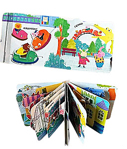 Buch in der Handfläche. Karussells. Pop-up Panorama