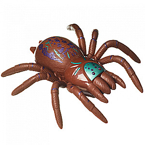 Spielzeug - Scherzartikel. Braune Spinne (klettert an Glas entlang)
