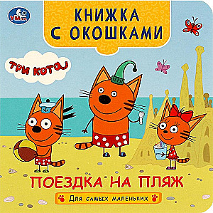 Książka z okienkami - Wycieczka na plażę. Trzy koty